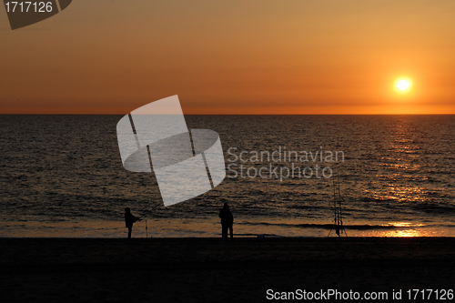 Image of Anglers at Sunset