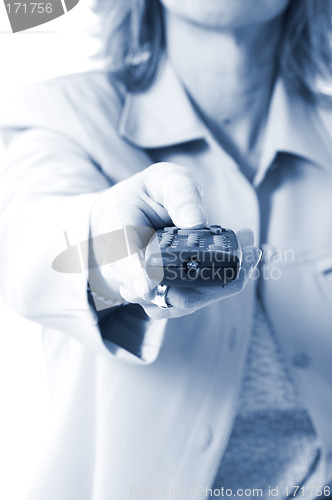 Image of woman holding remote