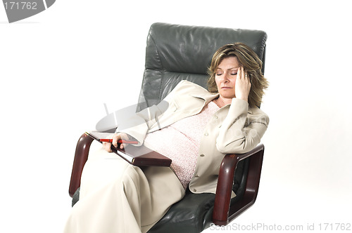 Image of business woman tired on chair