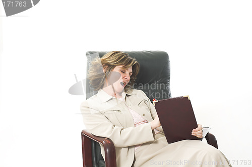 Image of business woman yawning