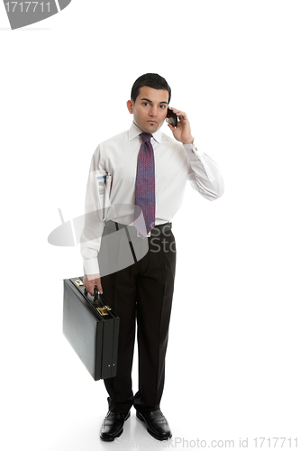 Image of Businessman using cell phone