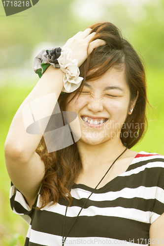 Image of Happy asian woman in countryside