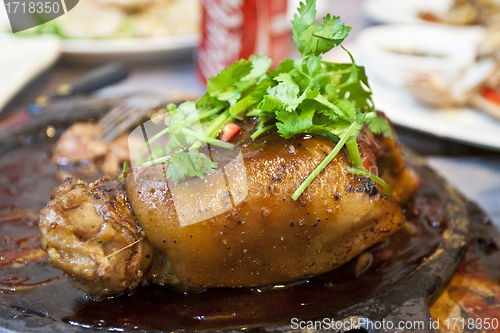 Image of Grilled knuckle of pork with black pepper