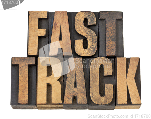 Image of fast track words in wood type