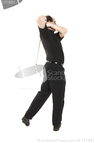 Image of man playing golf