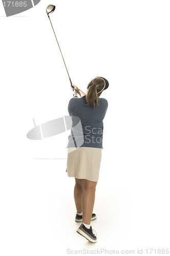 Image of woman playing golf