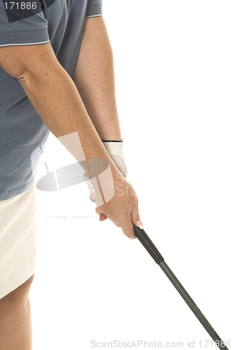 Image of woman playing golf