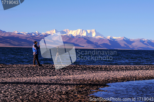 Image of Landscape at lakeside with a photographer's silhouette