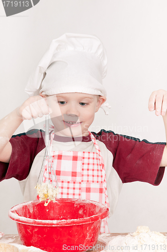 Image of boy with red bowl