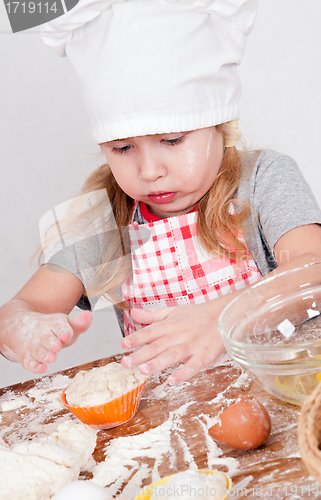 Image of girl in chef's hat