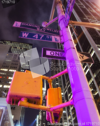 Image of New York City Street Signs at Night