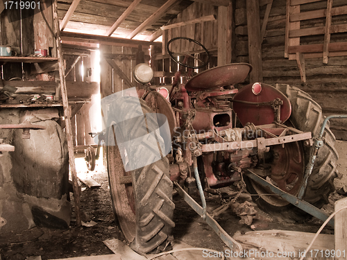 Image of Old Tractor in a Barn