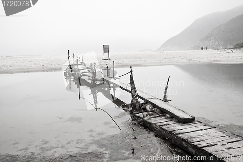 Image of Desolated pier next to the sea