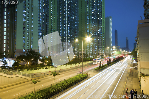 Image of City with night traffic along the road