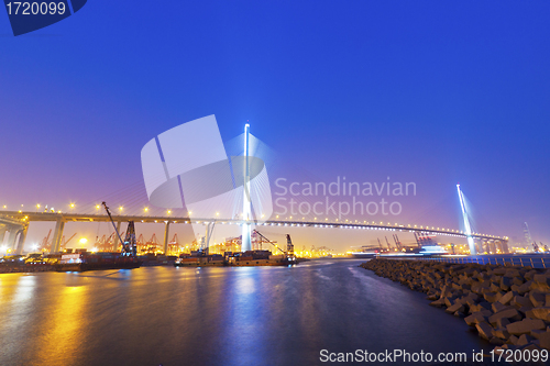 Image of Hong Kong bridge at cargo terminal at night