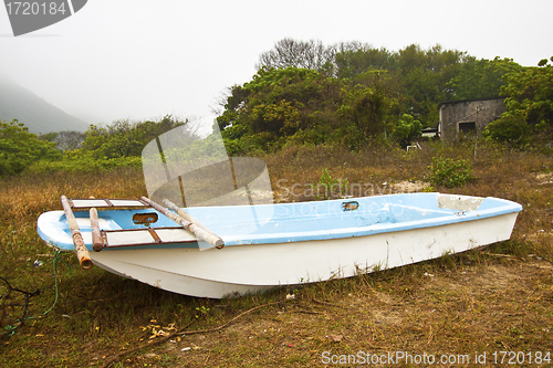 Image of Single boat on the ground