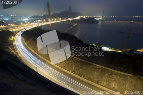 Image of Ting Kau Bridge and highway at night in Hong Kong