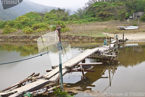 Image of Wooden bridge along the river in Hong Kong