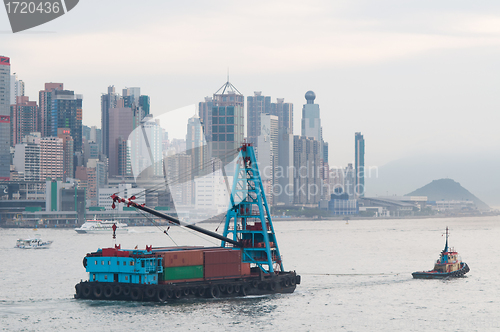 Image of Barge with containers in Hong Kong