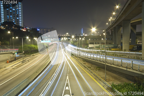 Image of Traffic through downtown of Hong Kong at night