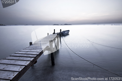 Image of Sunset pier with low saturation style