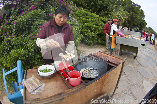 Image of Chinese hawker in China