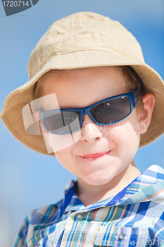 Image of Boy in sun glasses