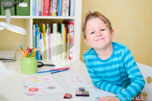 Image of Portrait of happy schoolboy