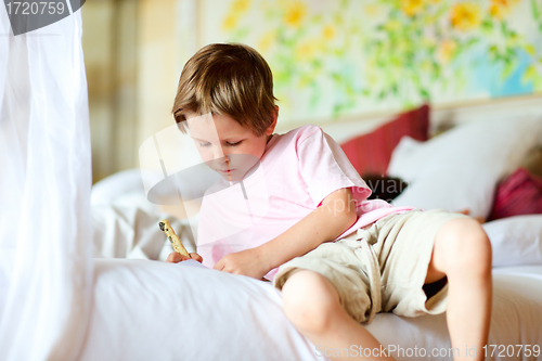 Image of Portrait of 5 years old boy at home
