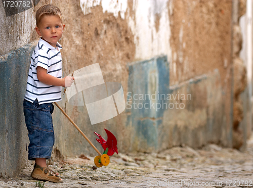 Image of Little one with handmade toy