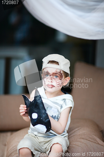 Image of Boy with face painted