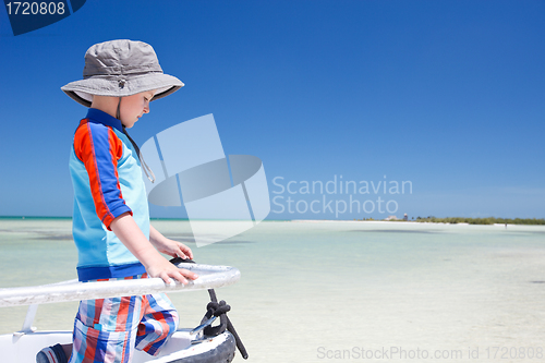 Image of Little boy on yacht