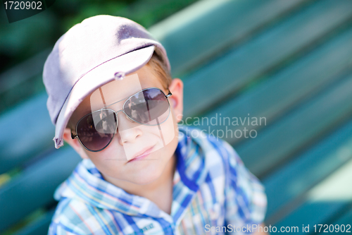 Image of Stylish boy in sun glasses