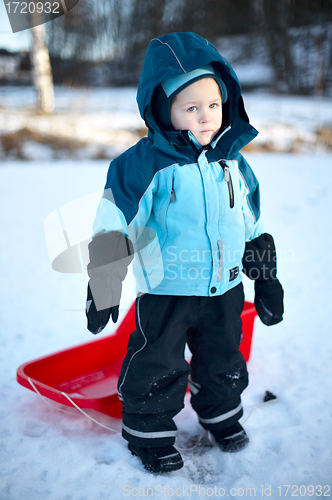 Image of Boy with sledge