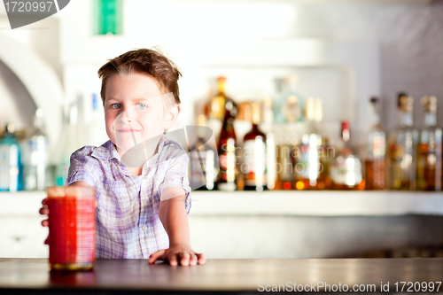 Image of Cute boy at bar