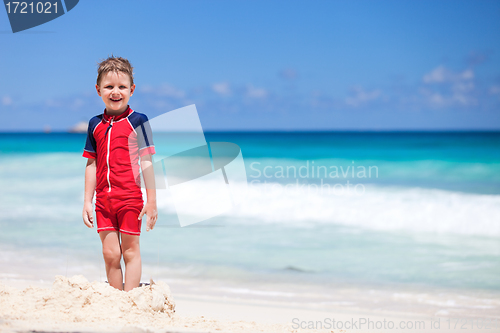 Image of Little boy at beach