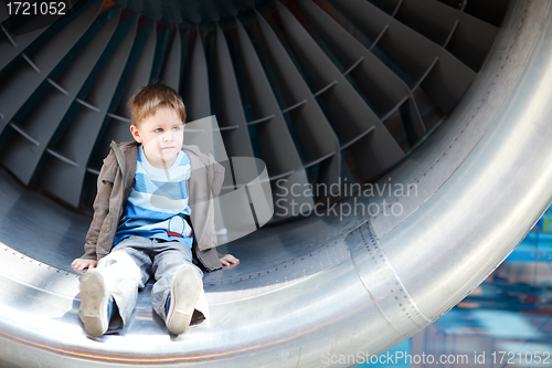Image of Boy inside turbine