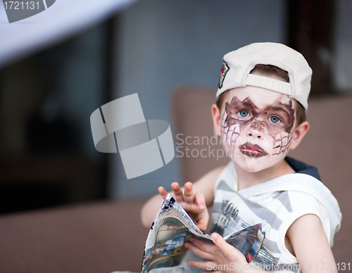 Image of Boy with face painted