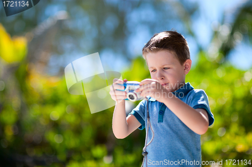 Image of Boy with camera