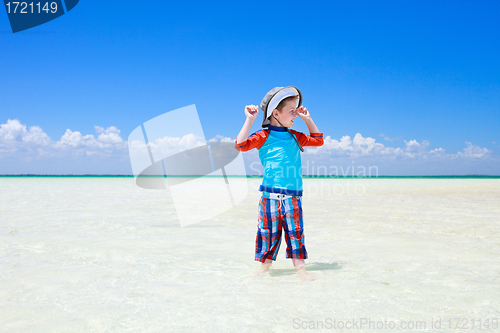 Image of Little boy in shallow water
