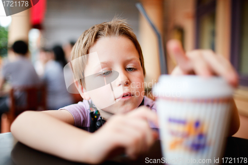 Image of Boy in cafe