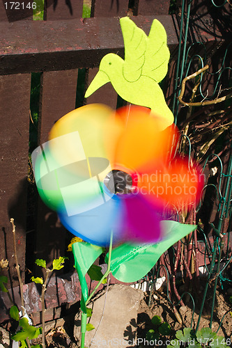 Image of colorful windmill spinning in the wind