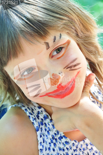 Image of happy child with funny painted face