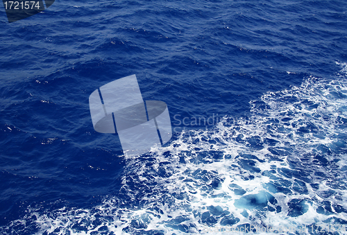 Image of Dark blue sea water surface with ripple as background 