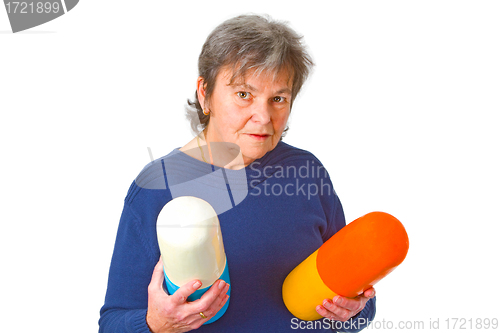 Image of Senior woman with pills