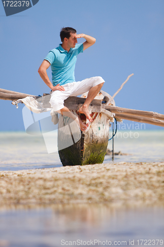 Image of Man and boat