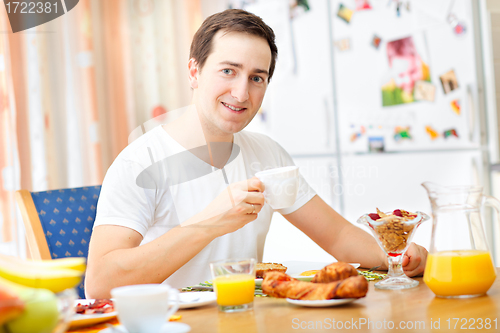 Image of Man having breakfast