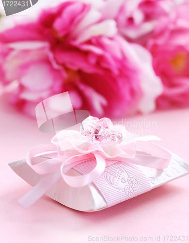 Image of Pink present box with pacifier
