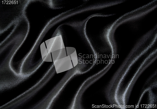 Image of Smooth elegant black silk as background 