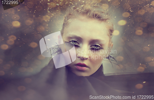 Image of beautiful girl with creative make-up mask